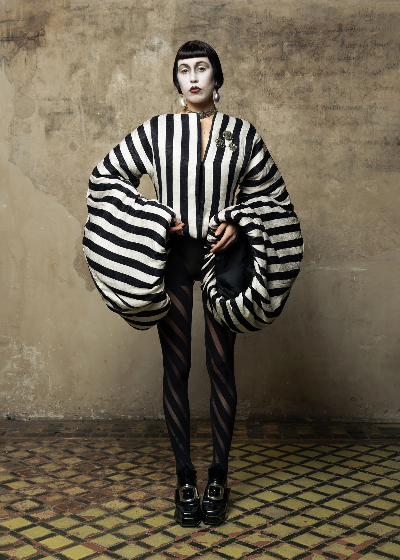 Hellion lookbook, look 01, front view. Full garment silhouette.